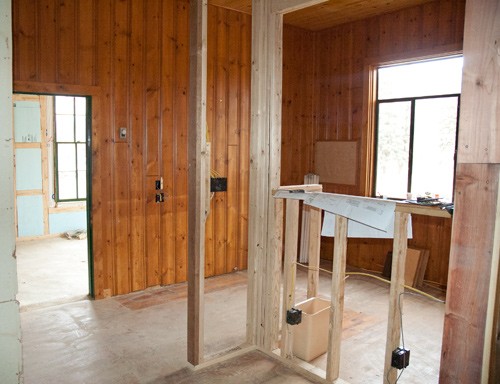 new office space at colorado guest ranch famed in with wood walls and bead board