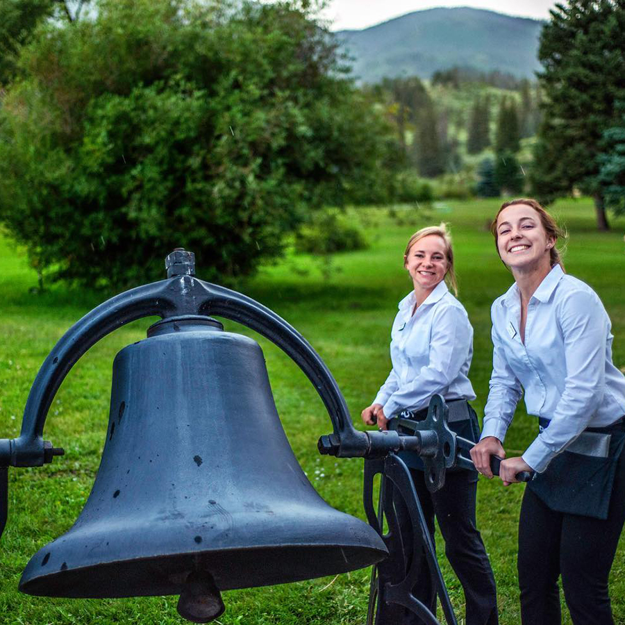 waitstaff ringing dinner bell