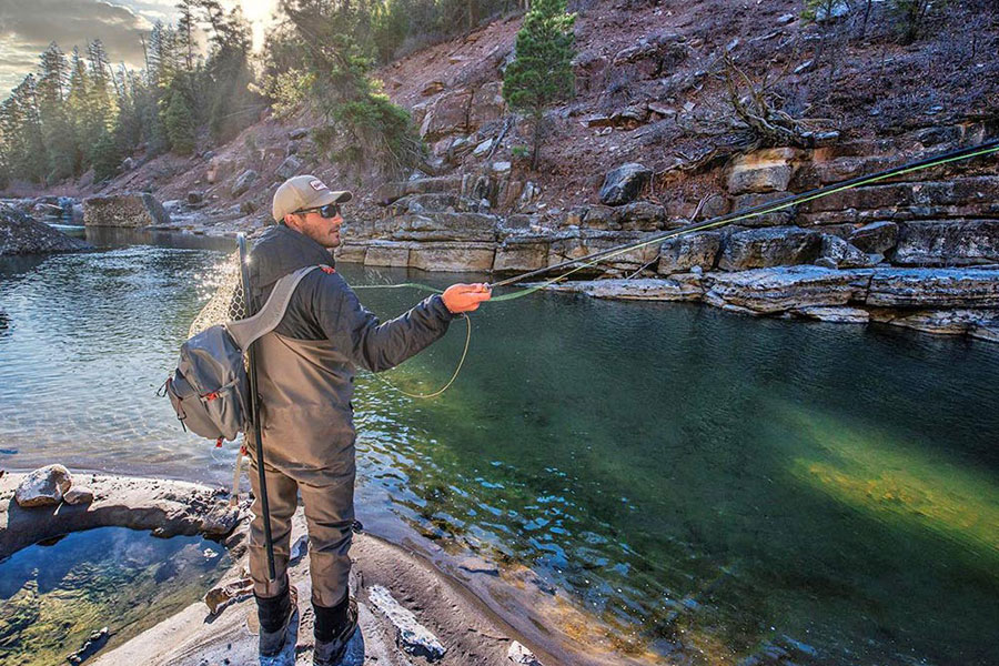 man fly fishing